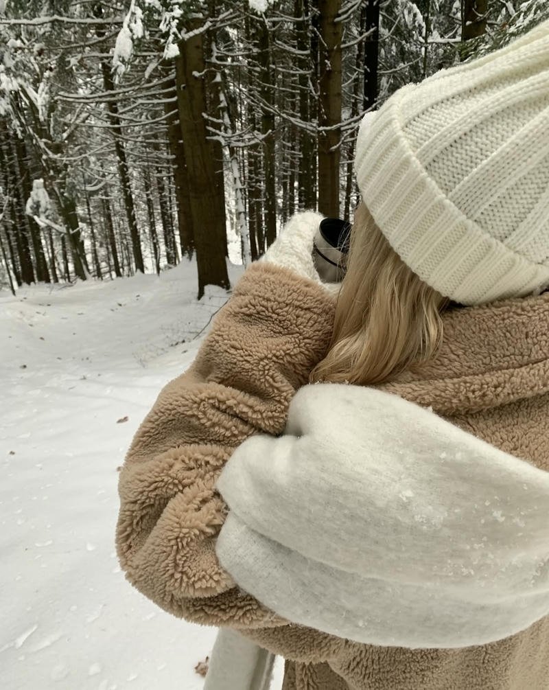 Cozy winter hoodie portrait surrounded by snow winter aesthetic pfp