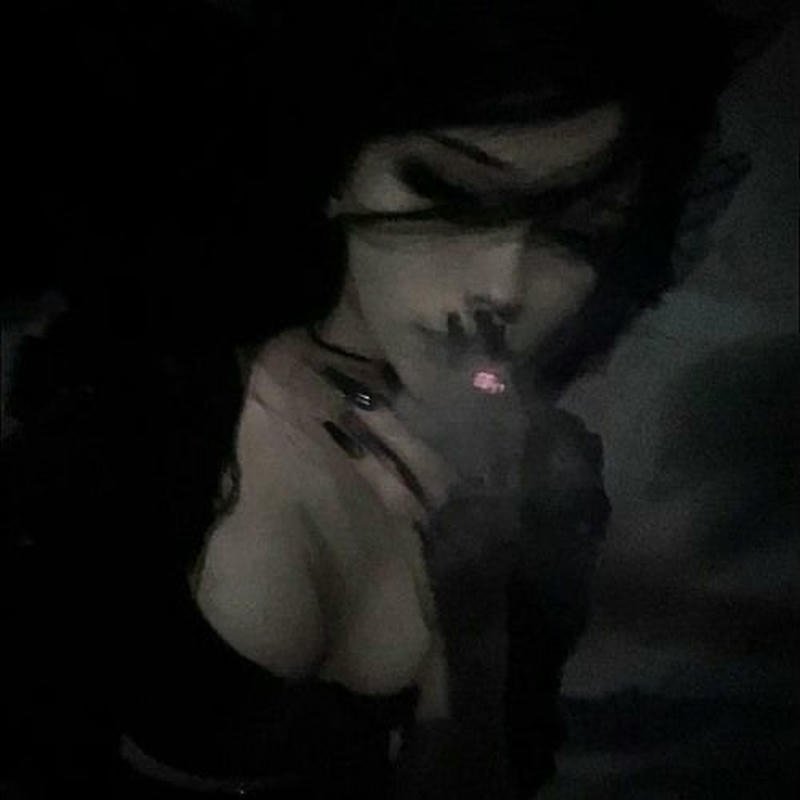 Shadow cloak character with glowing eyes badass pfp