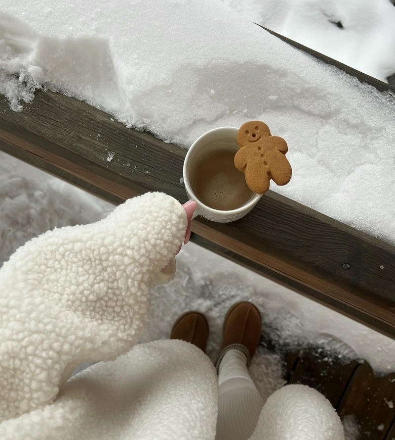 Snowfall street lights glowing softly creating cozy winter aesthetic pfp